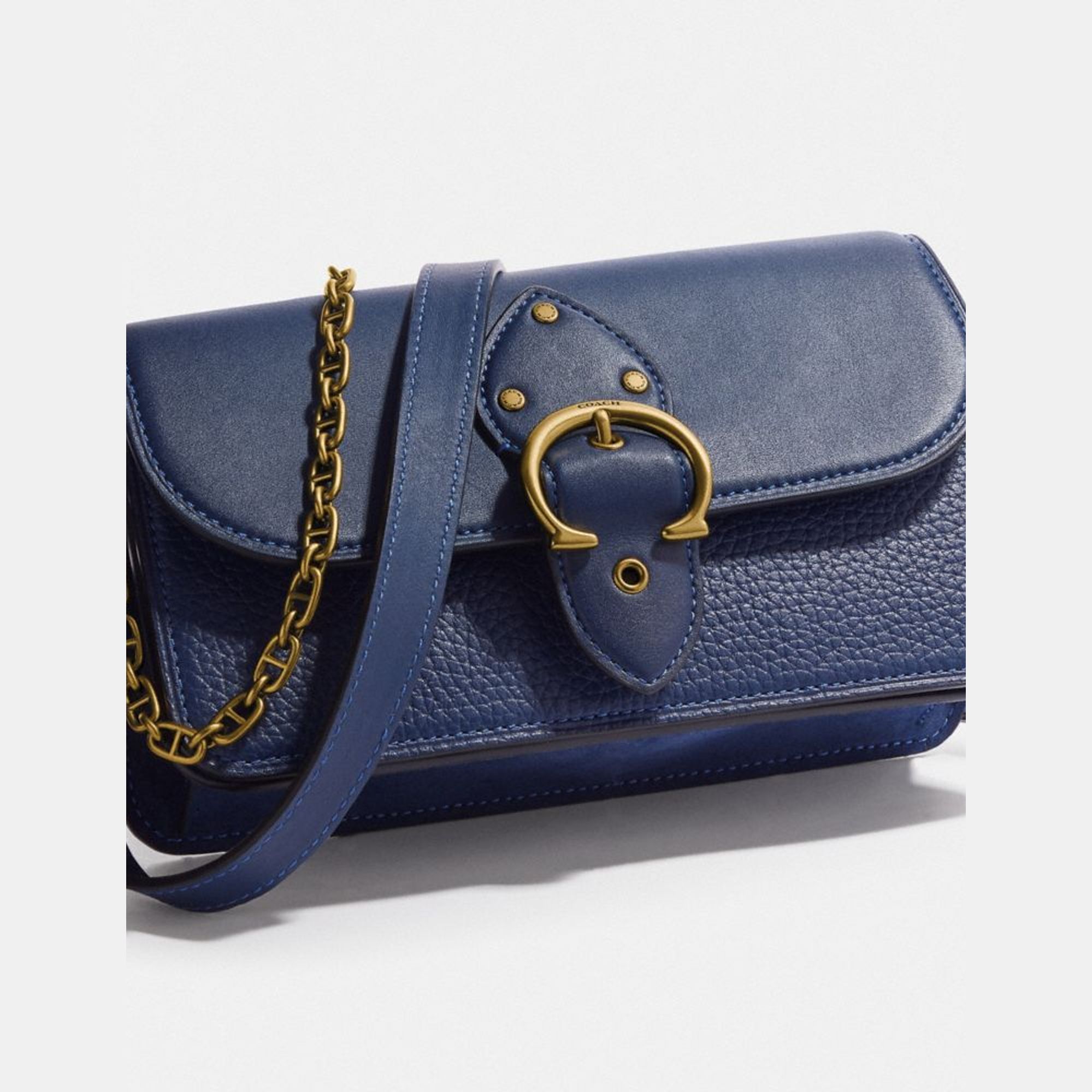 beat crossbody clutch